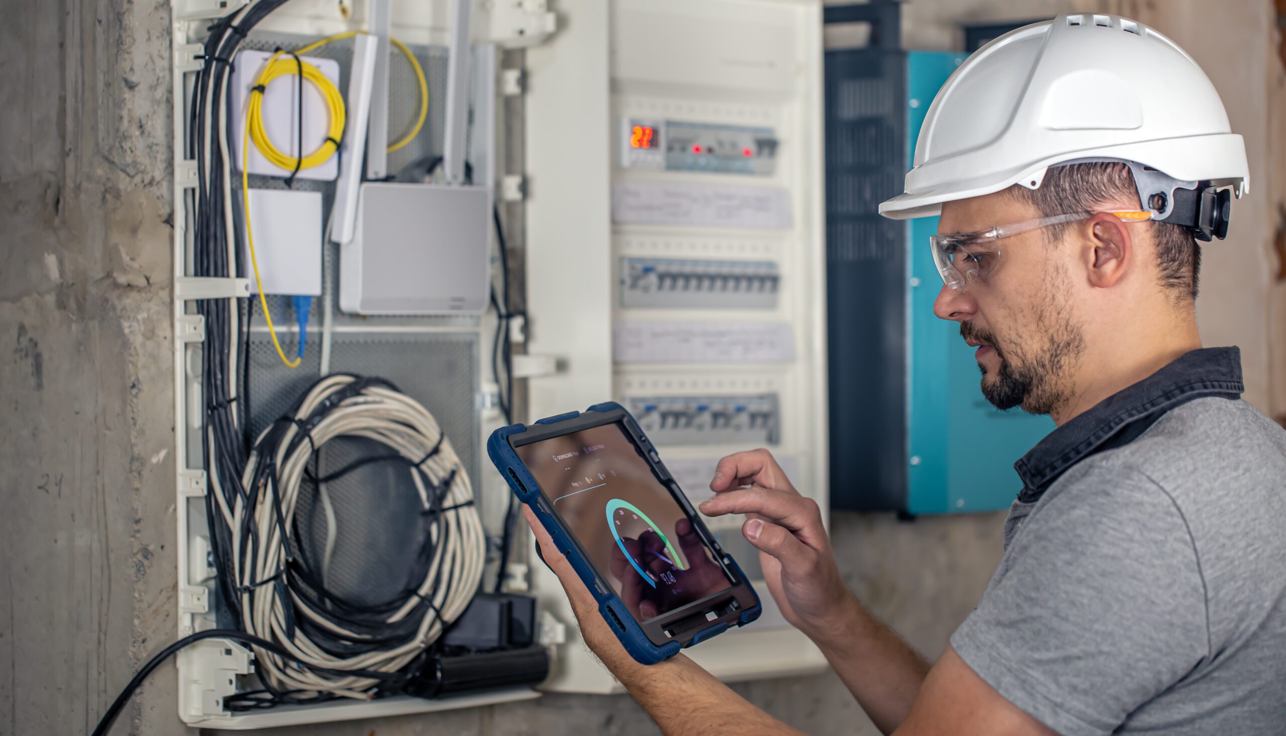 local electrician performing routine electrical inspection